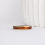 hawaiian golden koa wood inlay in a yellow gold slim band