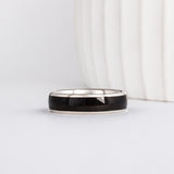 mens black wedding ring made from recycled white gold and ebony wood inlay