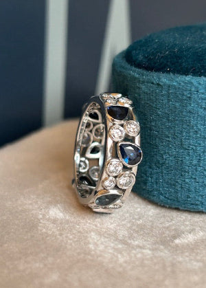 sapphires and diamonds are reworked into a platinum modern band
